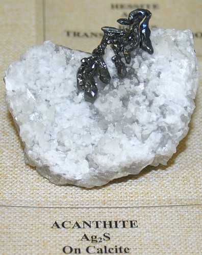 Acanthite crystals on calcite, Argentite