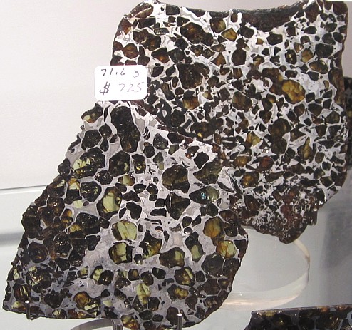 Palasite meteorite, transparent Olivene inclusions