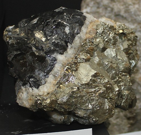 Wolframite (black) with quartz and pyrite